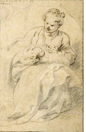 A Woman Holding A Swaddled Baby